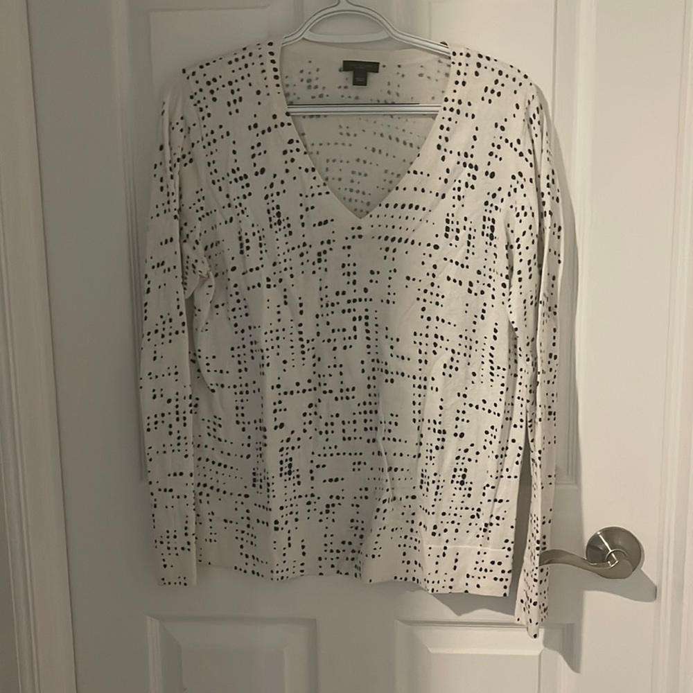 Ivory sweater with black dot pattern. New York and Company size L